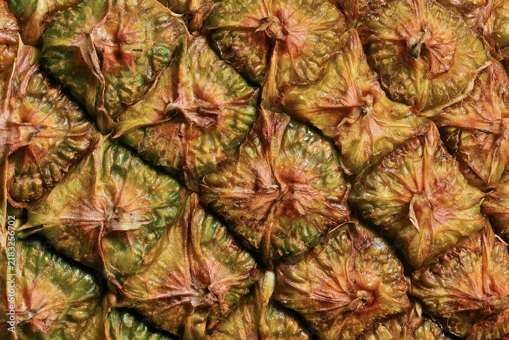 Fototapeta premium Close-up view of pineapple skin showing texture and patterns