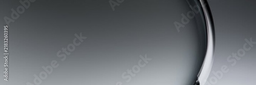 Abstract gray gradient background with a curved metallic silver edge smooth curve modern design