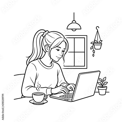 young woman working on laptop at home office