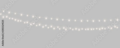 Christmas light garland with radiant warm bulbs. Festive decoration on a transparent PNG background. Suitable for holiday posters, cards, and web designs.