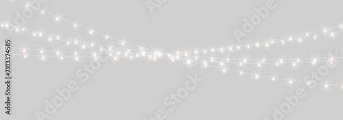 Christmas lights with soft glowing bulbs and festive sparkles. Warm golden illumination creates a charming holiday atmosphere. Ideal for posters. PNG