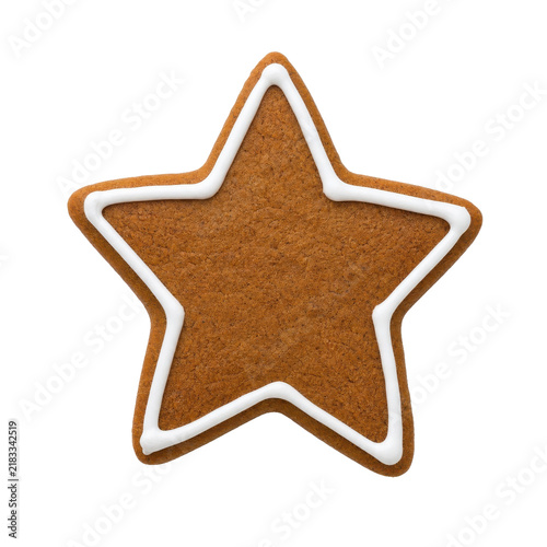 Canvastavla Delicious star-shaped gingerbread cookie with white icing border, perfectly isol