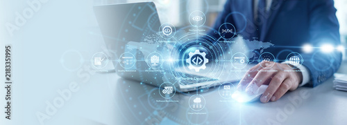 Fotografie Program developer working on laptop, software development and coding process