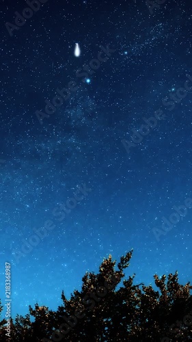 Constellations and Milky Way stars on a dark countryside skies. Time-lapse video.