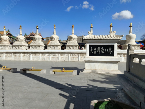 White Buddhist Pagodas in a Traditional Chinese Temple Courtyard
