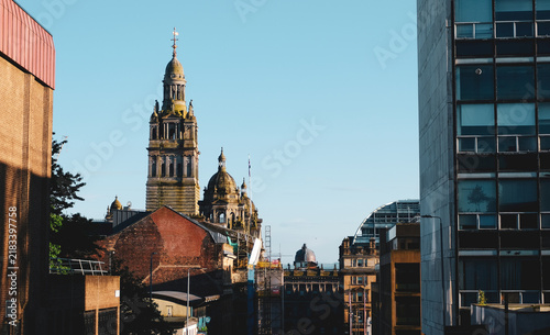 Historic Urban Skyline with Ornate Tower and Modern Buildings