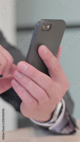 Close Up of Businessman Browsing Internet on Smartphone, Vertical Video