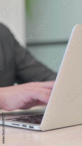 Close Up of Businessman Typing on Laptop Keyboard, Vertical Video