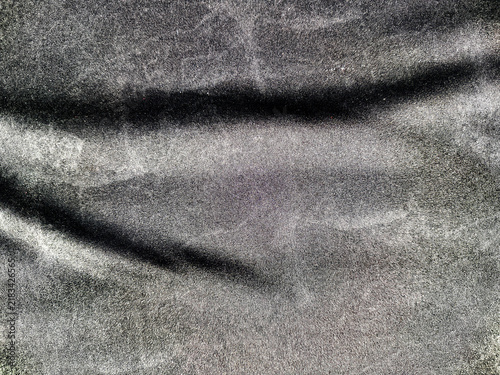 Foto Closeup of black velvet fabric texture with soft folds