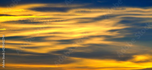Quadro su tela Clouds and the light reflected from the sunset, Dramatic sky background