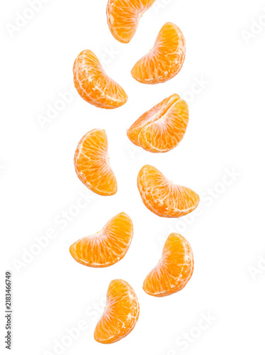 Canvas Print Fresh, vibrant peeled tangerine segments gracefully falling through the air, isolated on transparent