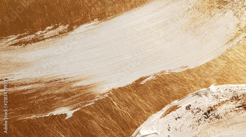 Abstract backdrop combining textured metallic gold paper and wide organic white brushstrokes with fine golden and brown flecks, frayed painterly edges