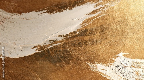 Abstract backdrop combining textured metallic gold paper and wide organic white brushstrokes with fine golden and brown flecks, frayed painterly edges