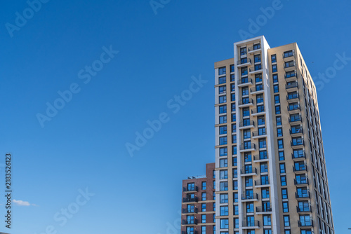 Canvas Print Modern Residential High-Rise Building Under Clear Sky