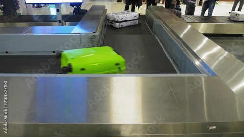 Close up of luggage being moved around an airport, colorful suitcases, 4k