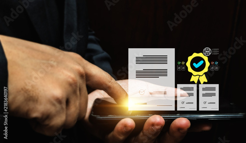 Фотография quality certification and digital checkmarks, representing compliance, quality a