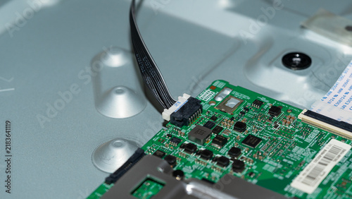 Canvastavla Cable wire connector plugged into green printed circuit board close up
