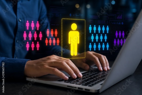 Person using laptop with digital human icon and network avatars overlay