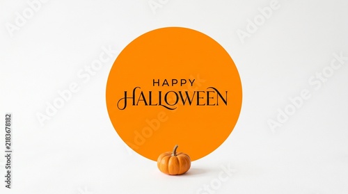 Happy Halloween greeting card design with a small pumpkin on an orange circle background.