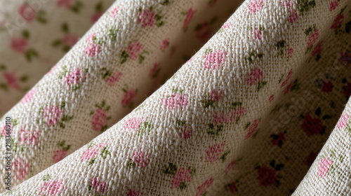 Vintage calico fabric with small floral print texture close-up  
