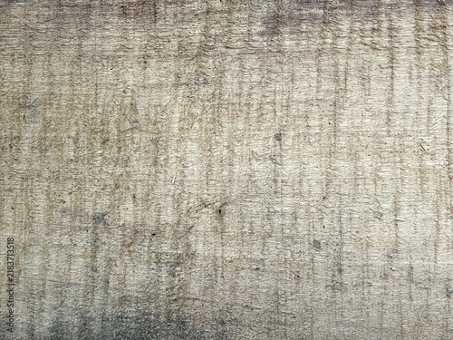 Obraz na płótnie Pale gray weathered wood with a bleached appearance, dense rough-sawn marks, and