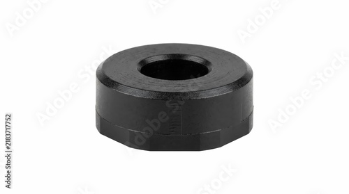 Sturdy black plastic washer with a cylindrical design isolated on a white background for industrial machine parts and hardware projects