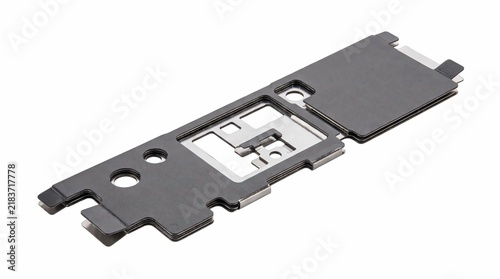 Precision machined metal mounting plate for industrial electronics featuring matte black coating and intricate cutouts isolated on a white background