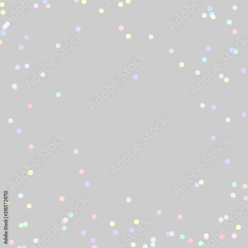 Картината върху платно Multicolored confetti dots scatter on a solid black background