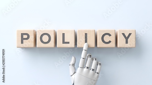 Robot hand touching POLICY word on wooden blocks
