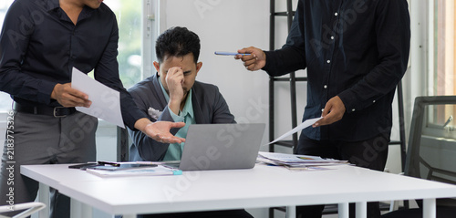 фотографія Businessman feeling stressed overwhelmed by work pressure.