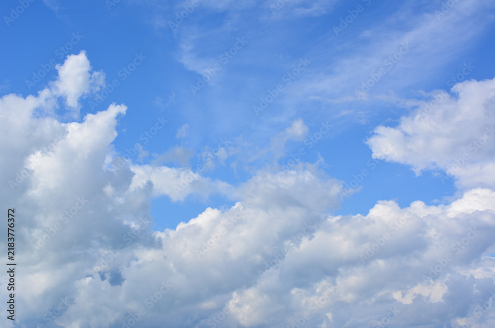 Obraz premium Blue Sky with Fluffy White Clouds, sky background, copy space