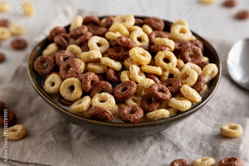 Картината върху платно Healthy Breakfast Cereal with Whole Milk in a Bowl, side view