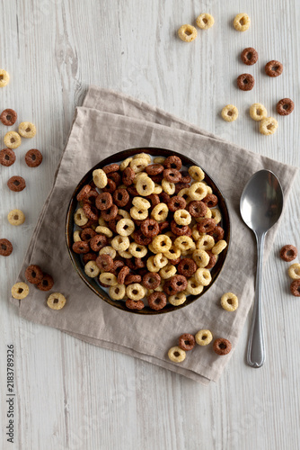 Fotografie Healthy Breakfast Cereal with Whole Milk in a Bowl, top view.