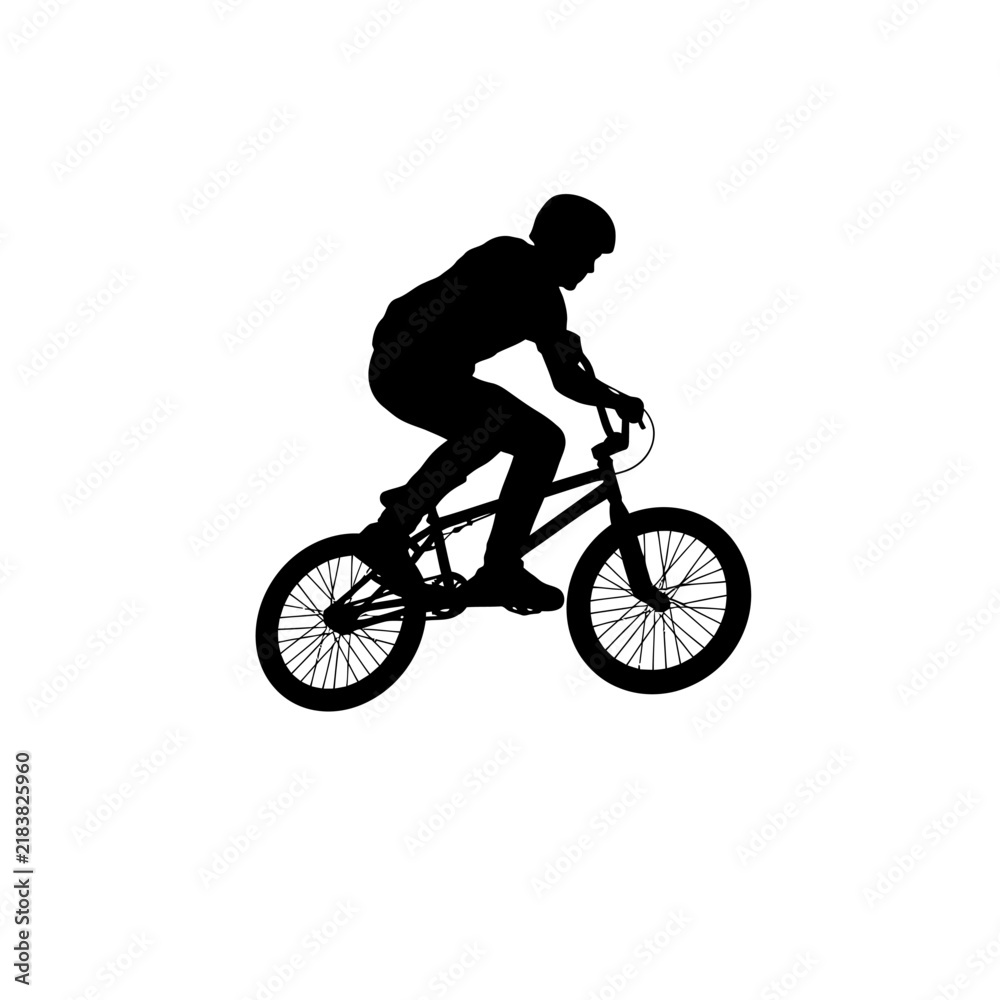 Obraz premium Black silhouette of a person riding a BMX bike performing a jump.