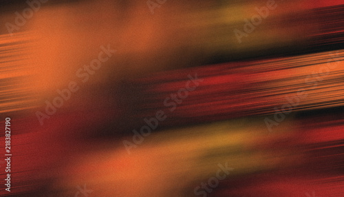 Quadro su tela Abstract streaks of orange and brown create a blurred dynamic background texture