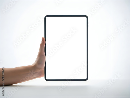 Person holding a digital tablet with blank screen isolated on white background