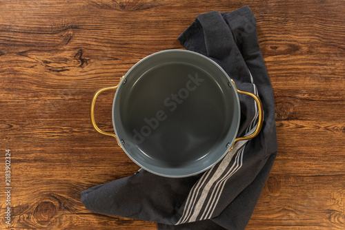 Cooking Pot on Rustic Table with Cloth