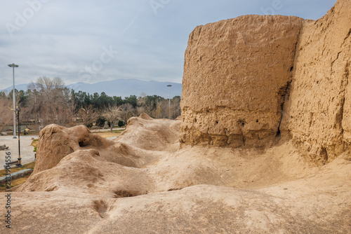 Jalali Castle, Arg-e Jalali, ancient mudbrick fortress in Kashan, Iran. A close-up view of the fortress's massive battlements and fortifications