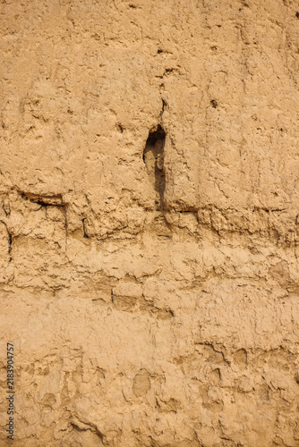 Jalali Castle, Arg-e Jalali, ancient mudbrick fortress in Kashan, Iran, Weathered adobe walls of a historic fortress. The texture and erosion of traditional earthen architecture