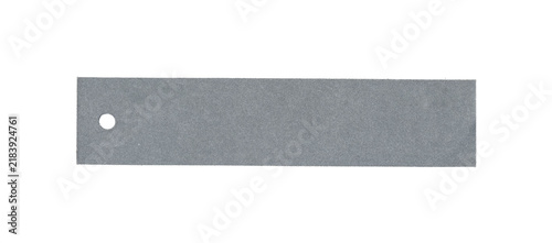 Gray narrow rectangular tag with small round hole near the left end