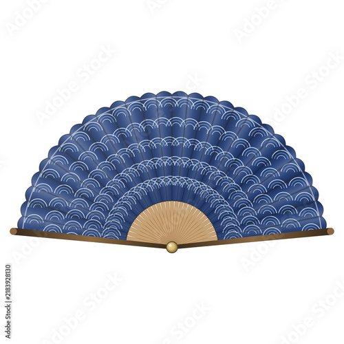Fotografie Japanese folding fan with indigo blue wave pattern and bamboo ribs, isolated on