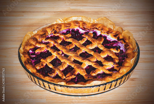 rustic blueberry pie on a glassy bakery mold