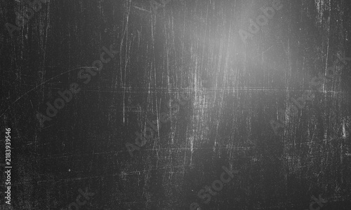 Dark grunge texture with abstract scratches and dust overlay for vintage design backgrounds Background