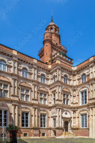 View of the inner courtyard at Hotel d'Assezat in Toulouse, France. Renaissance architecture under sunny sky