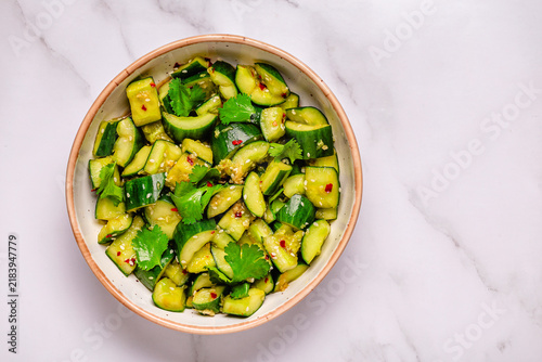 Obraz na plátne Chinese smashed cucumber salad with sesame