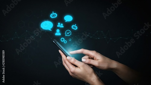 Hands holding a smartphone with floating glowing blue social media and communication against a dark abstract background, with network lines