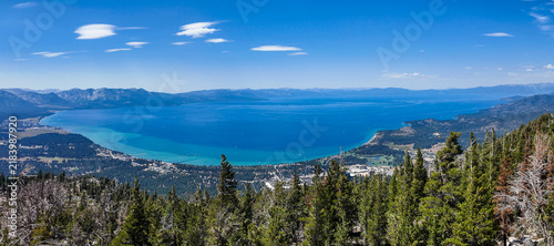 A view of Lake Tahoe, California, from the top of the mountain in the Sierra Nevada with South Lake Tahoe Below after a Ski Lift Ride