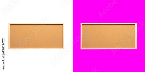 Fotografie Two rectangular cork message boards with wooden frames on divided color surfaces