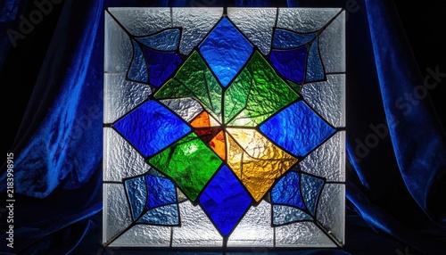 Intricate Stained Glass Window Panel with Geometric Diamond Pattern and Vibrant Colors