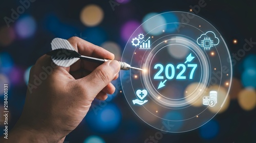 Futuristic 2027 Business Strategy Concept with Hand Touching Digital Technology Interface